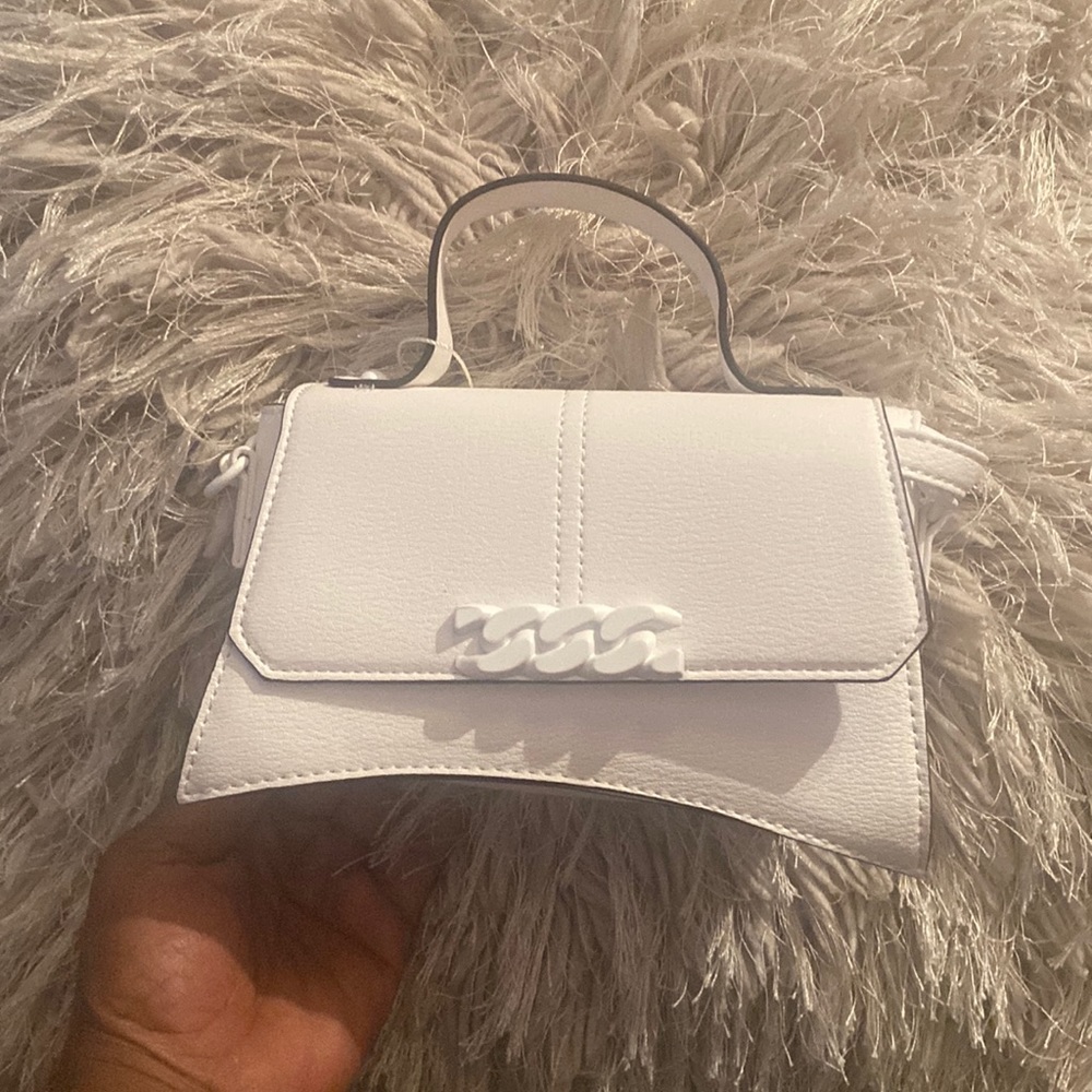 White bag with small handle and cross strap